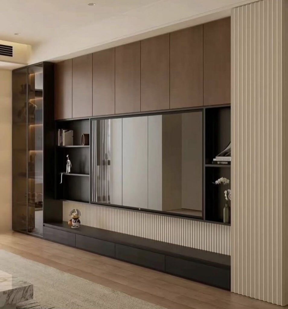 Built-In Shelving That Makes the TV Part of a Library