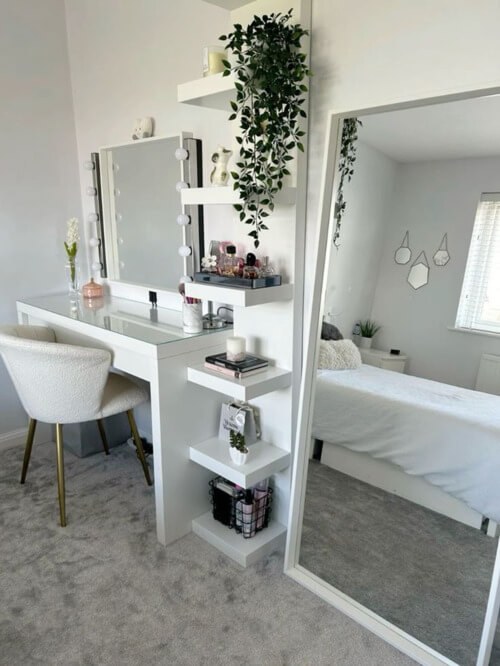 Layered Green Shelving for a Lush Vanity
